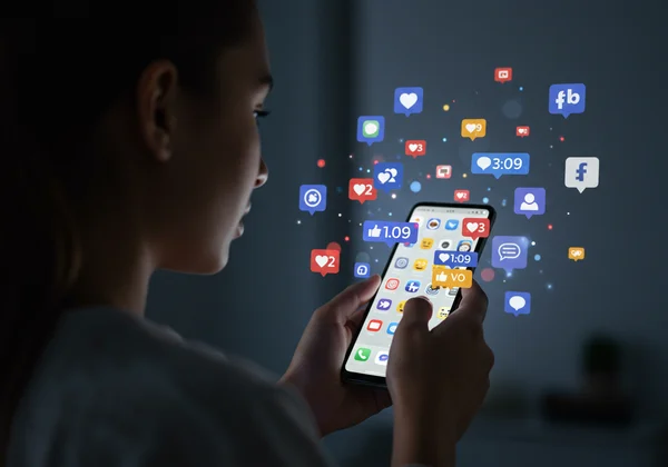 Social media icons and a person seeking validation, narcissism